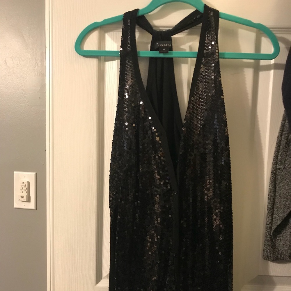 Medium black sequin vest.